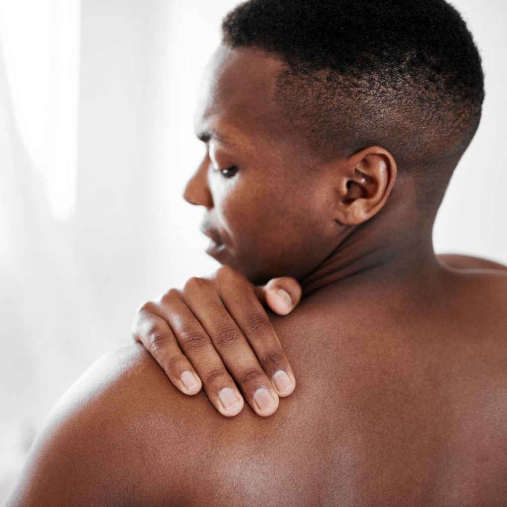 Cropped shot of a man suffering from shoulder pain