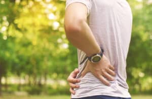 Man with hip pain from arthritis in New York City